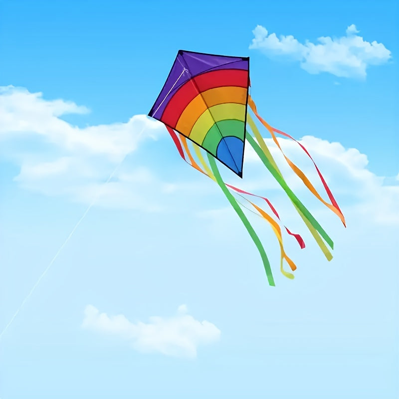 Cerf-volant arc-en-ciel avec de longs rubans colorés pour la plage et les jeux en plein air