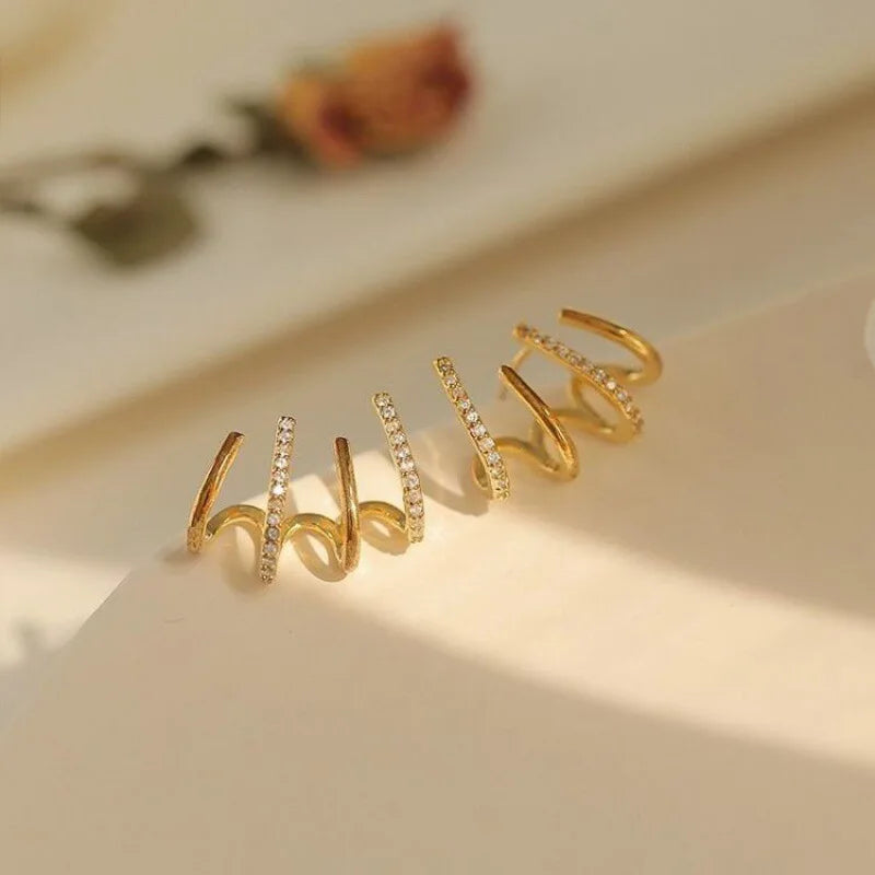 Boucles d'oreilles Astra Twist pour femmes, bijoux légers, finition hypoallergénique