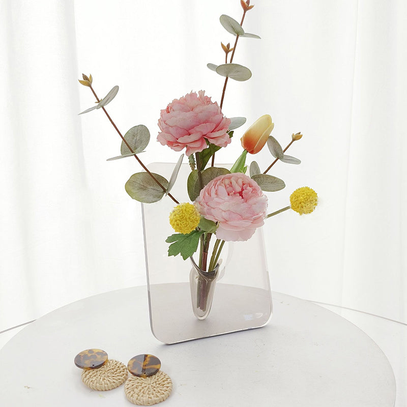 Cadre photo, vase, arrangement floral, ornement de bureau