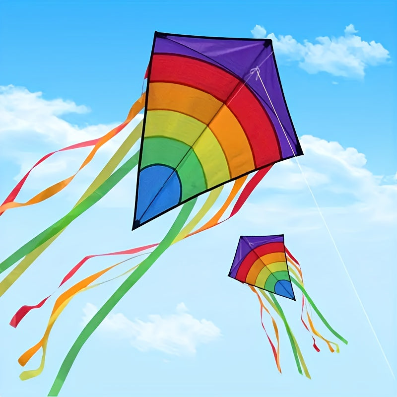 Cerf-volant arc-en-ciel avec de longs rubans colorés pour la plage et les jeux en plein air