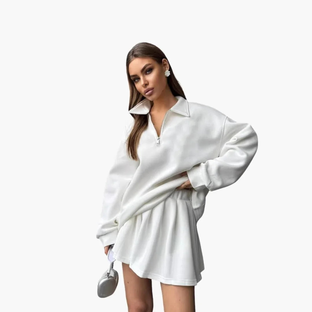 Pull femme avec demi-zip et jupe plissée