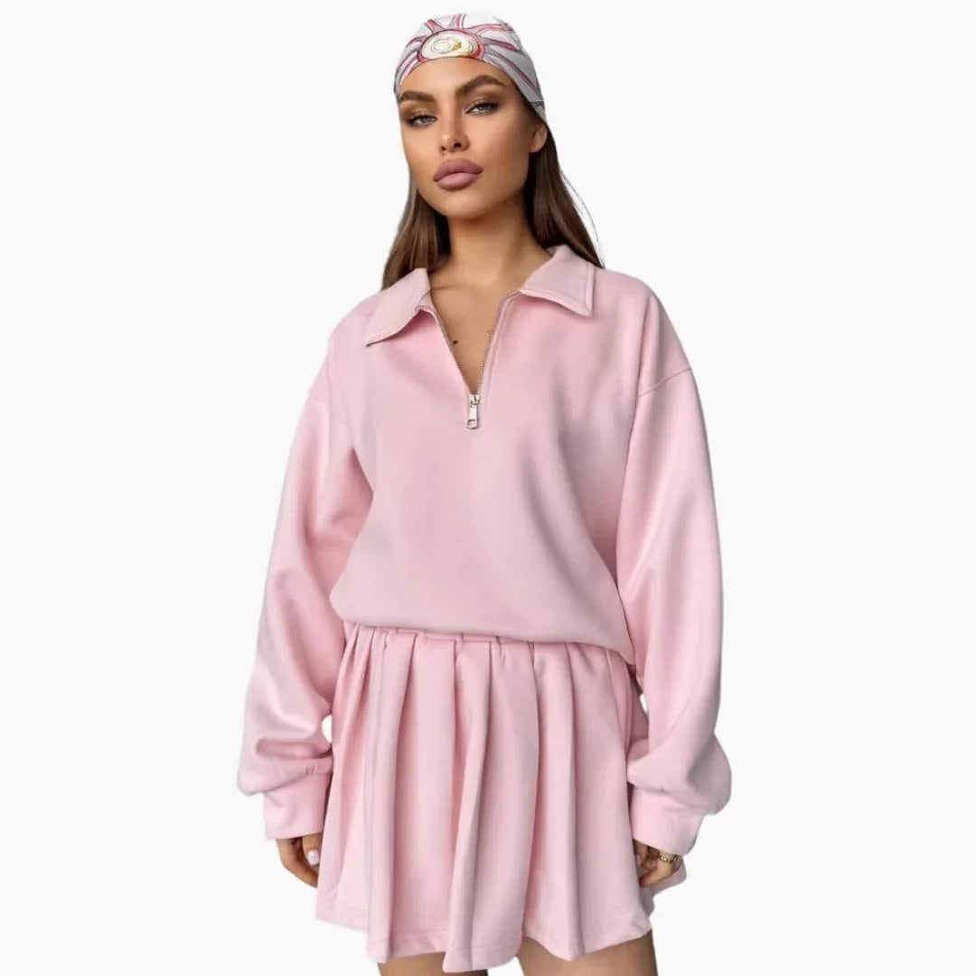 Pull femme avec demi-zip et jupe plissée