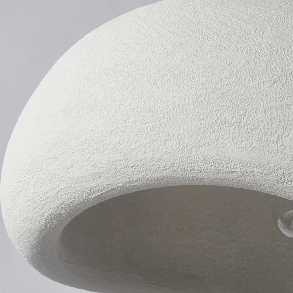 Lampe suspendue minimaliste avec texture naturelle et lumière d'ambiance chaleureuse pour salle à manger et salon | Sansotis