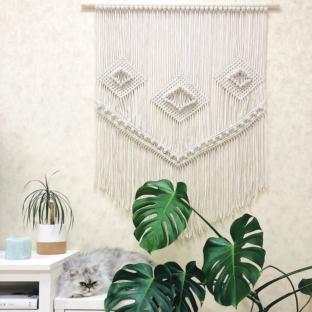 Décoration murale en macramé avec détails artistiques