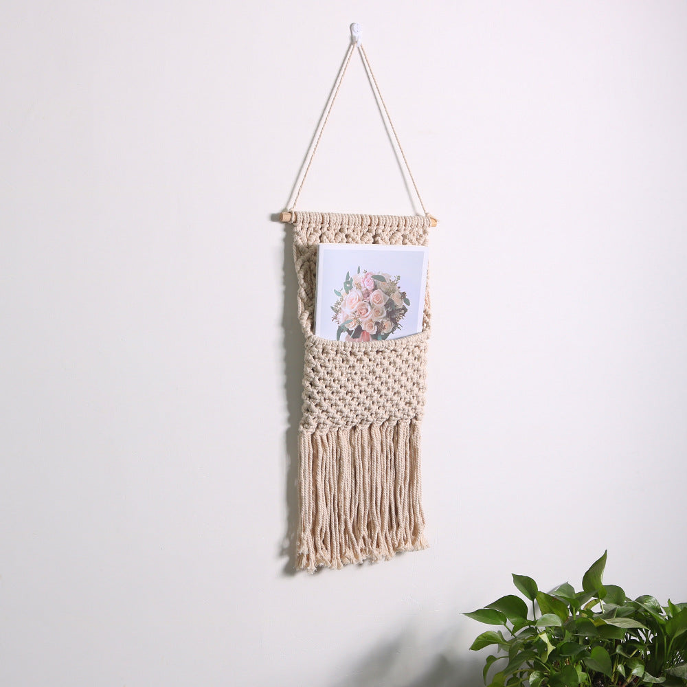 Décoration murale artistique en macramé avec une belle décoration à franges