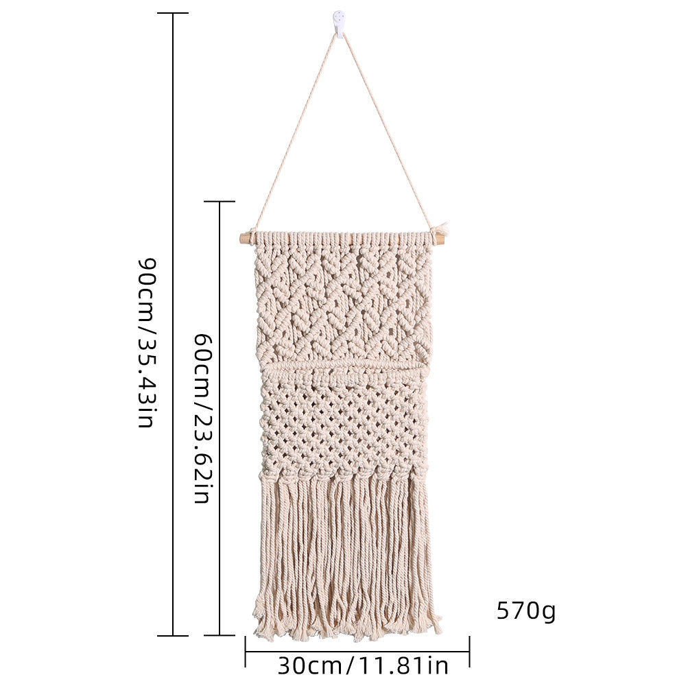Décoration murale artistique en macramé avec une belle décoration à franges