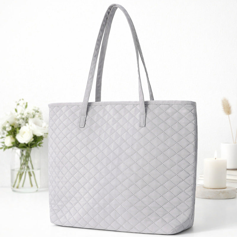 Sac à main moderne en matériau texturé