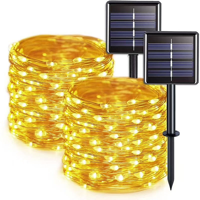 Guirlande lumineuse solaire en fil de cuivre avec panneaux à double piquet