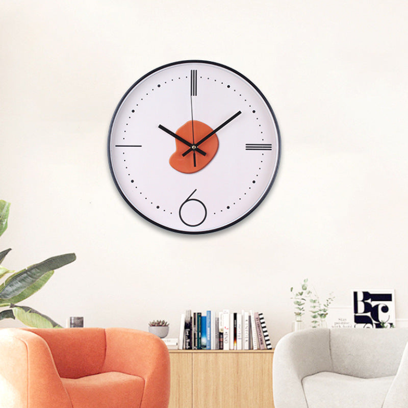 Horloge murale avec élégant motif de feuilles