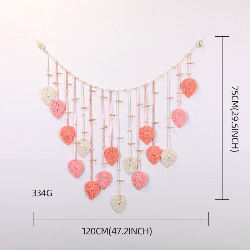 Décoration murale en macramé avec motif de feuilles