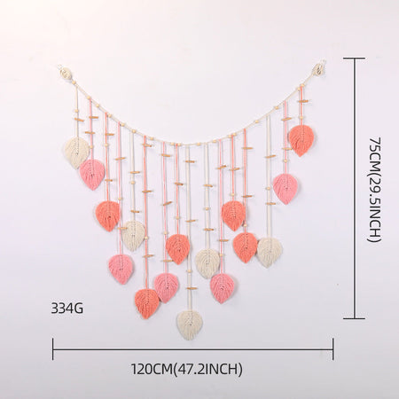 Décoration murale en macramé avec motif de feuilles