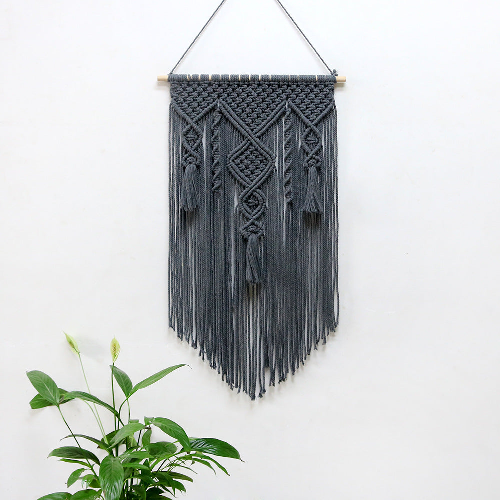 Décoration murale en macramé avec détails artistiques