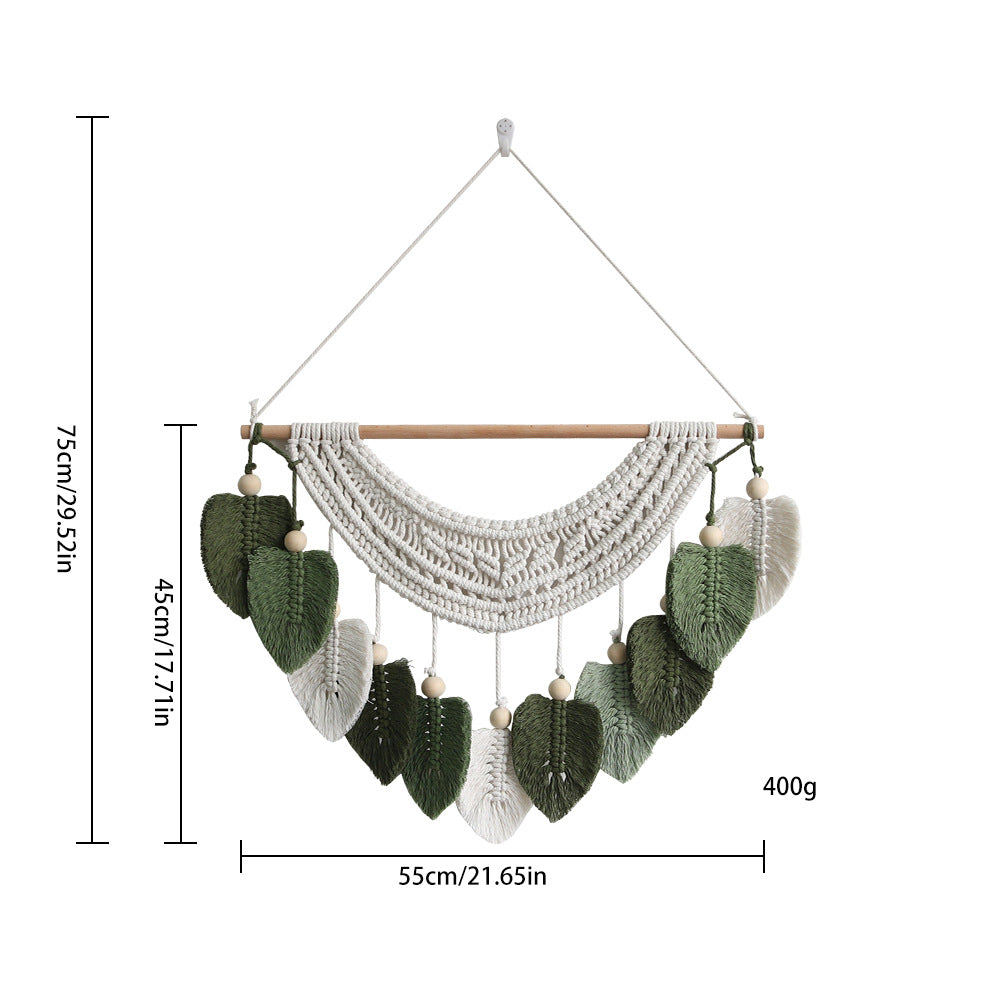 Décoration murale en macramé avec motif feuille
