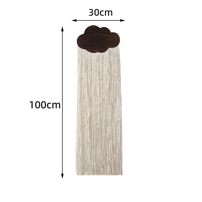 Décoration murale en macramé avec motif nuage