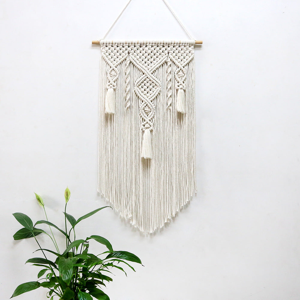 Décoration murale en macramé avec détails artistiques