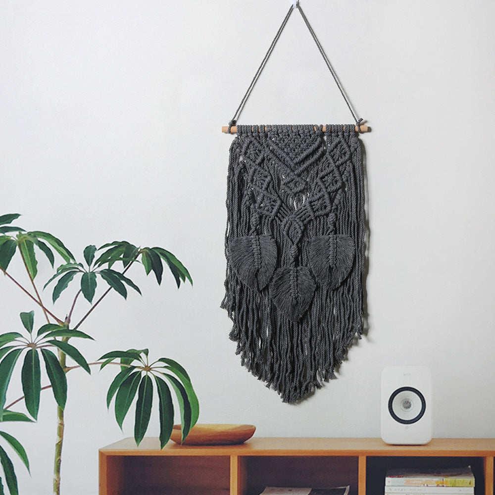 Décoration murale en macramé avec détails artistiques