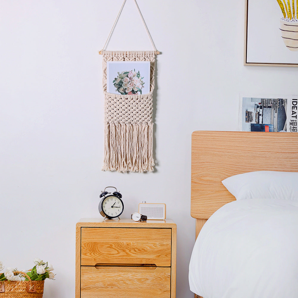 Décoration murale artistique en macramé avec une belle décoration à franges
