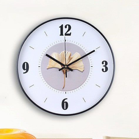 Horloge murale avec élégant motif de feuilles