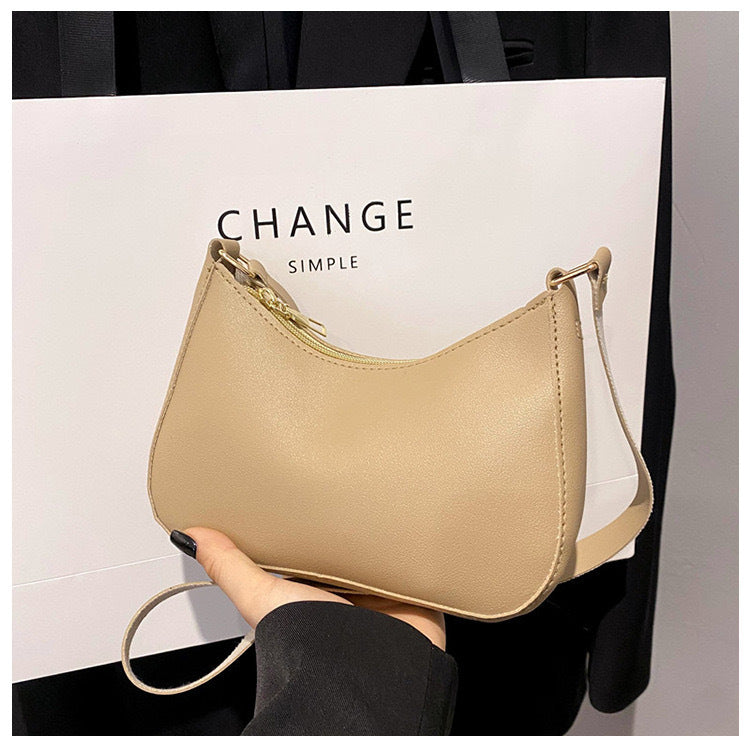 Sac à main élégant au design ondulé
