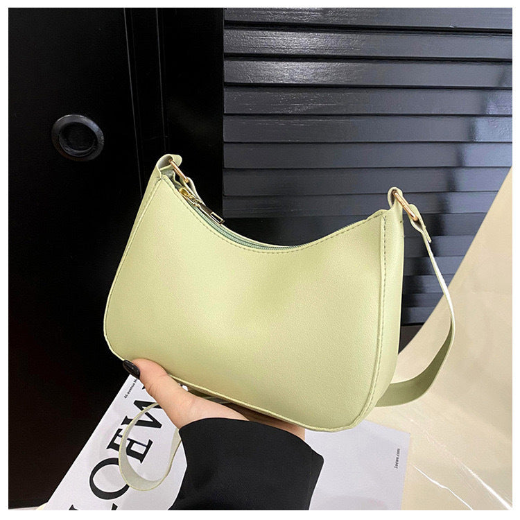 Sac à main élégant au design ondulé