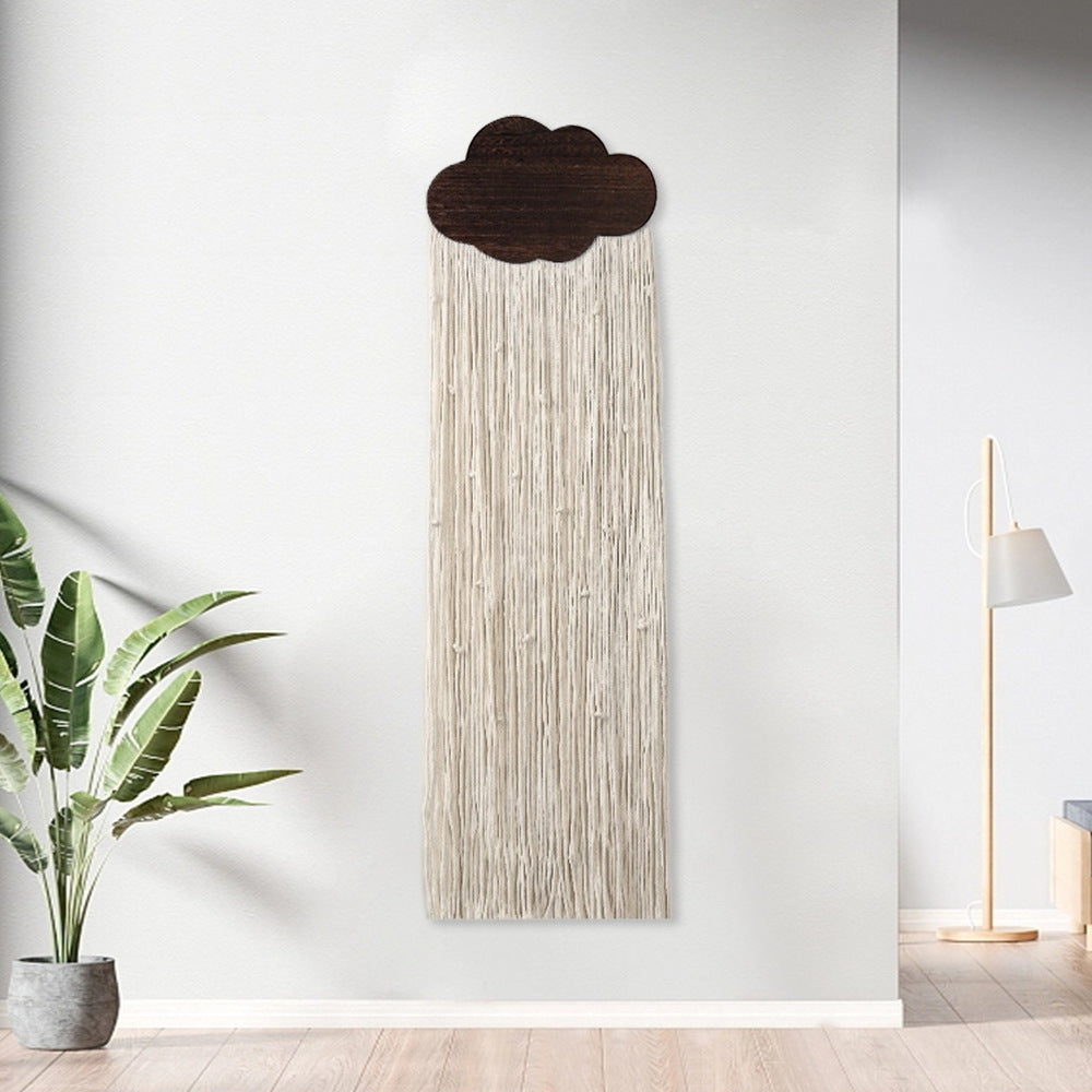 Décoration murale en macramé avec motif nuage