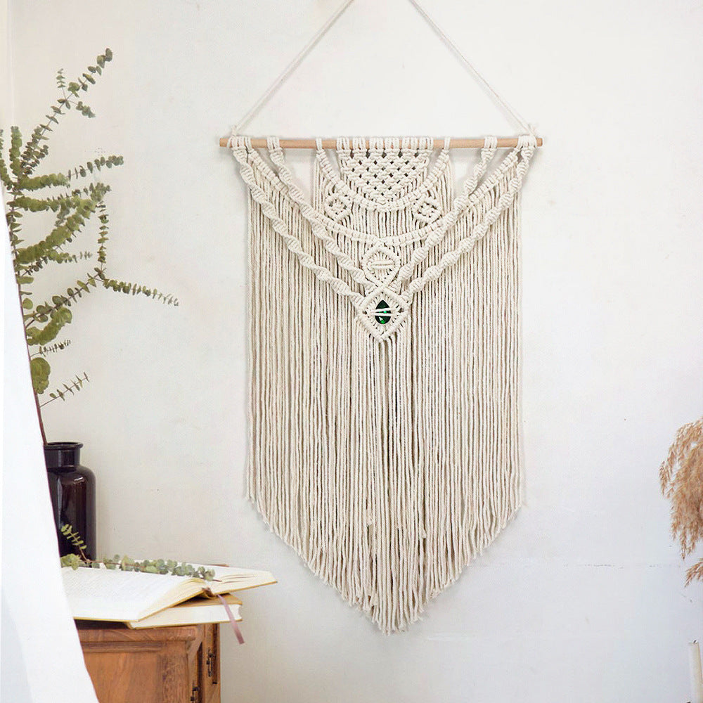 Décoration murale en macramé avec détails artistiques