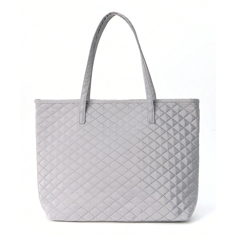 Sac à main moderne en matériau texturé