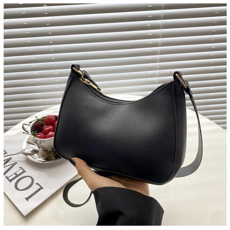 Sac à main élégant au design ondulé