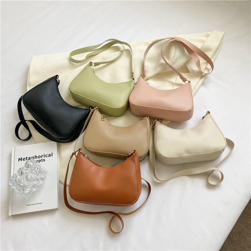 Sac à main élégant au design ondulé