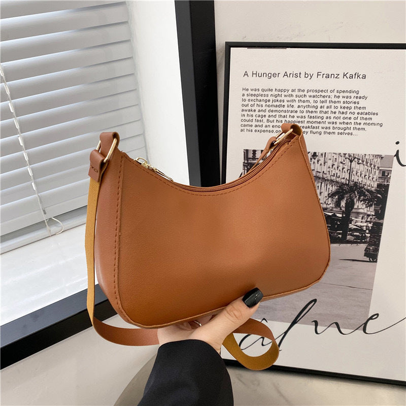 Sac à main élégant au design ondulé