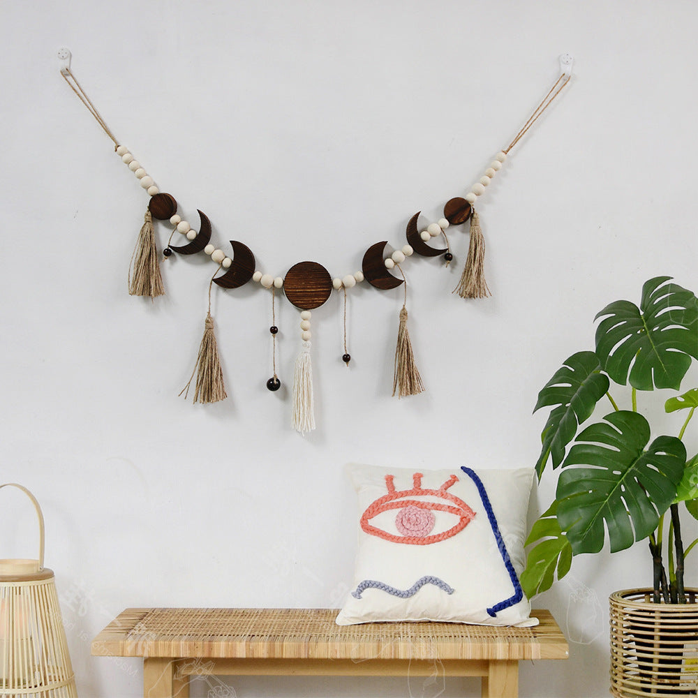 Décoration murale en macramé avec motif lune