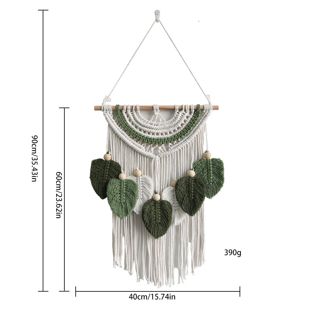 Décoration murale en macramé avec motif feuille