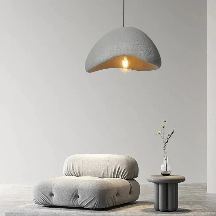 Lampe suspendue minimaliste avec texture naturelle et lumière d'ambiance chaleureuse pour salle à manger et salon | Sansotis