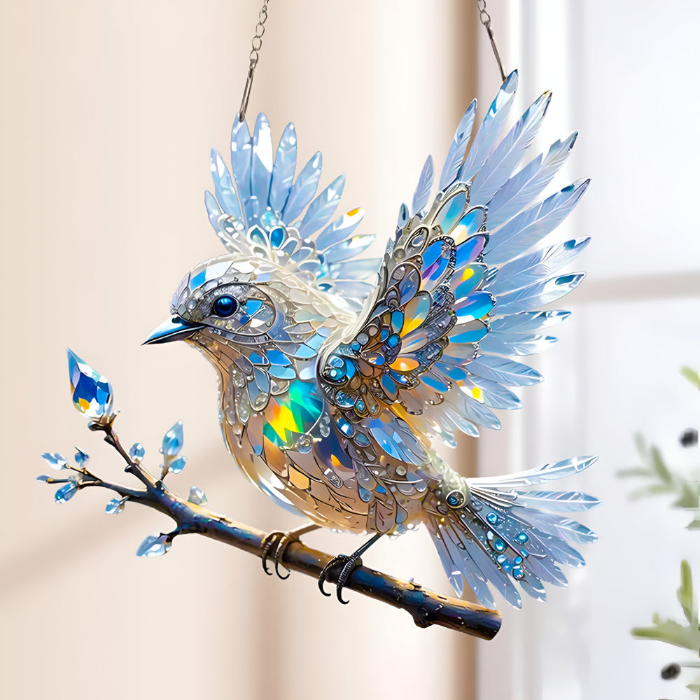 Attrape-soleil en acrylique avec design oiseau bleu, suspendu à une fenêtre
