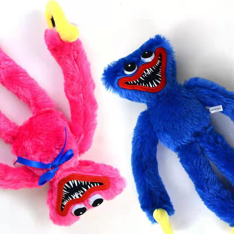 Jouet en peluche Huggy Wuggy rouge sur fond blanc