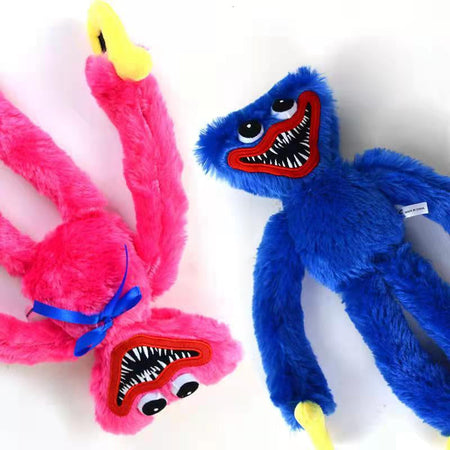Jouet en peluche Huggy Wuggy rouge sur fond blanc