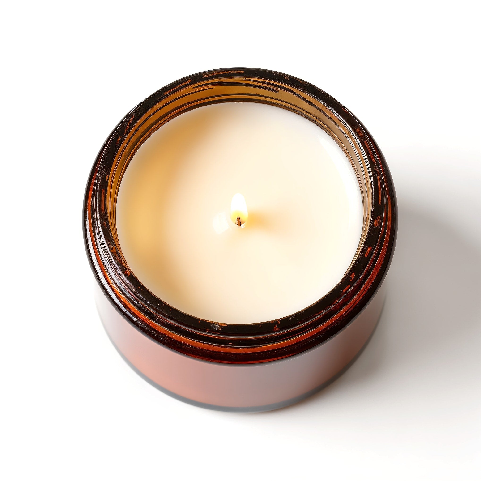 Bougie en cire de soja Amber Nights en pot de verre ambré
