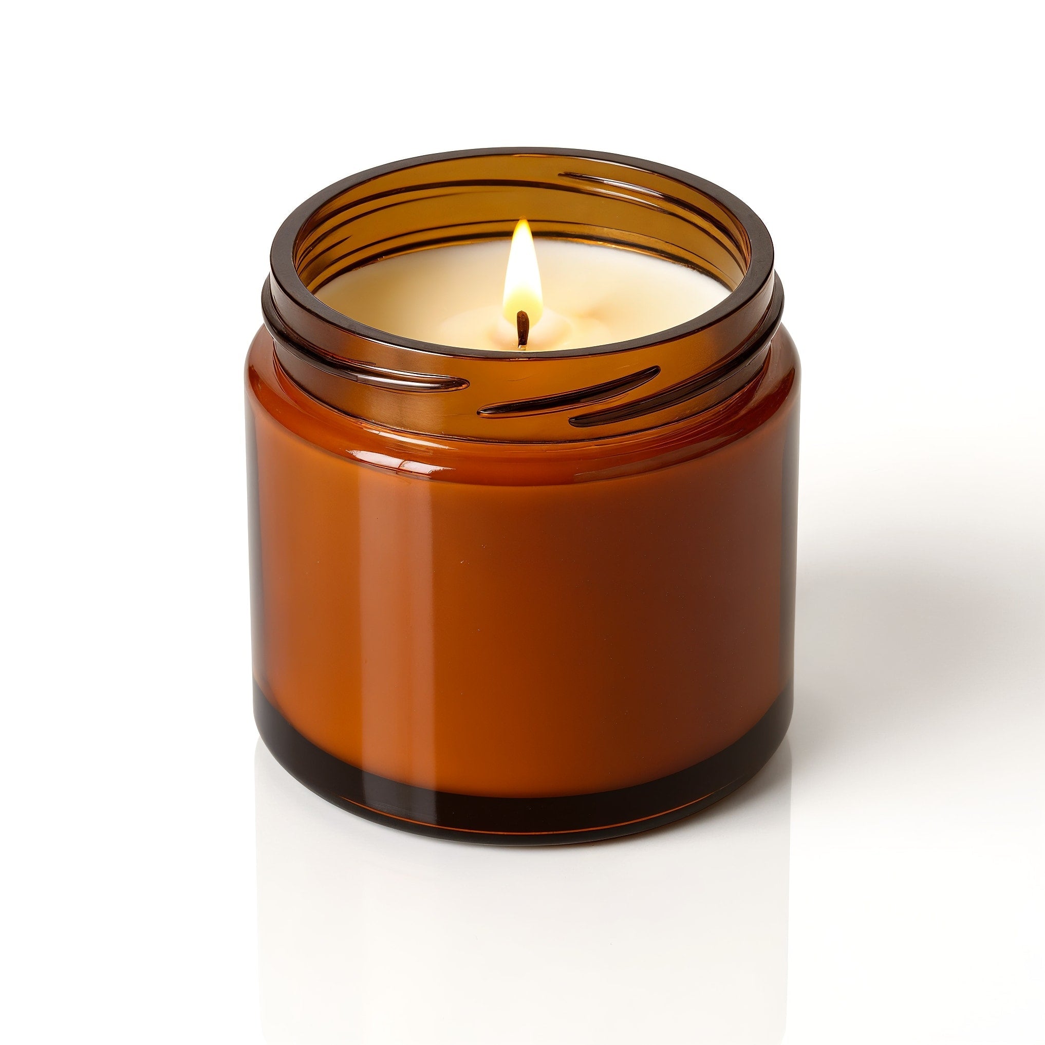 Bougie en cire de soja Amber Nights en pot de verre ambré