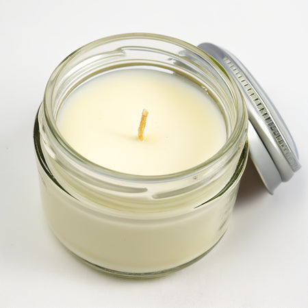 Bougie parfumée NARSAGO à la verveine citronnée en pot de verre transparent
