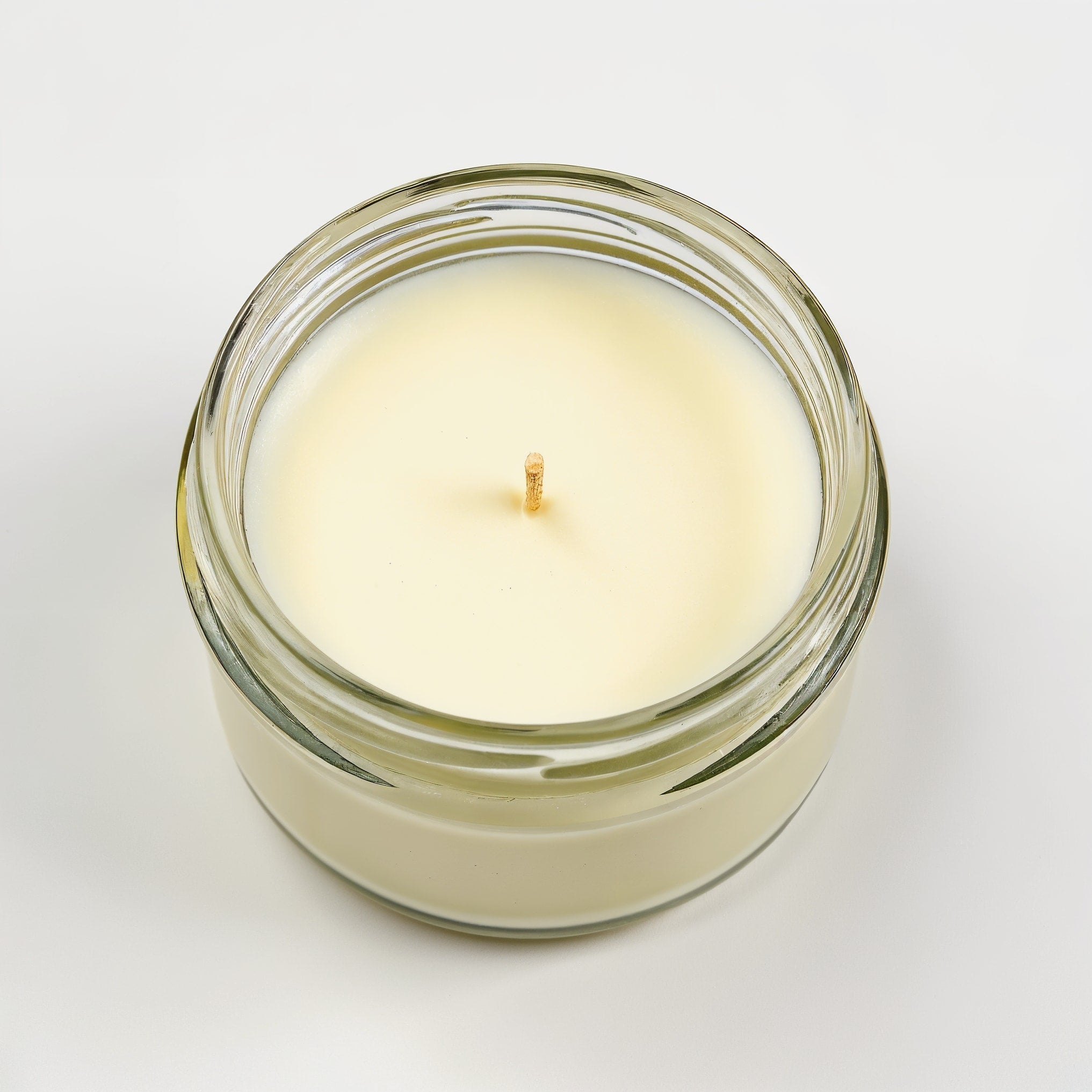 Bougie parfumée NARSAGO à la verveine citronnée en pot de verre transparent