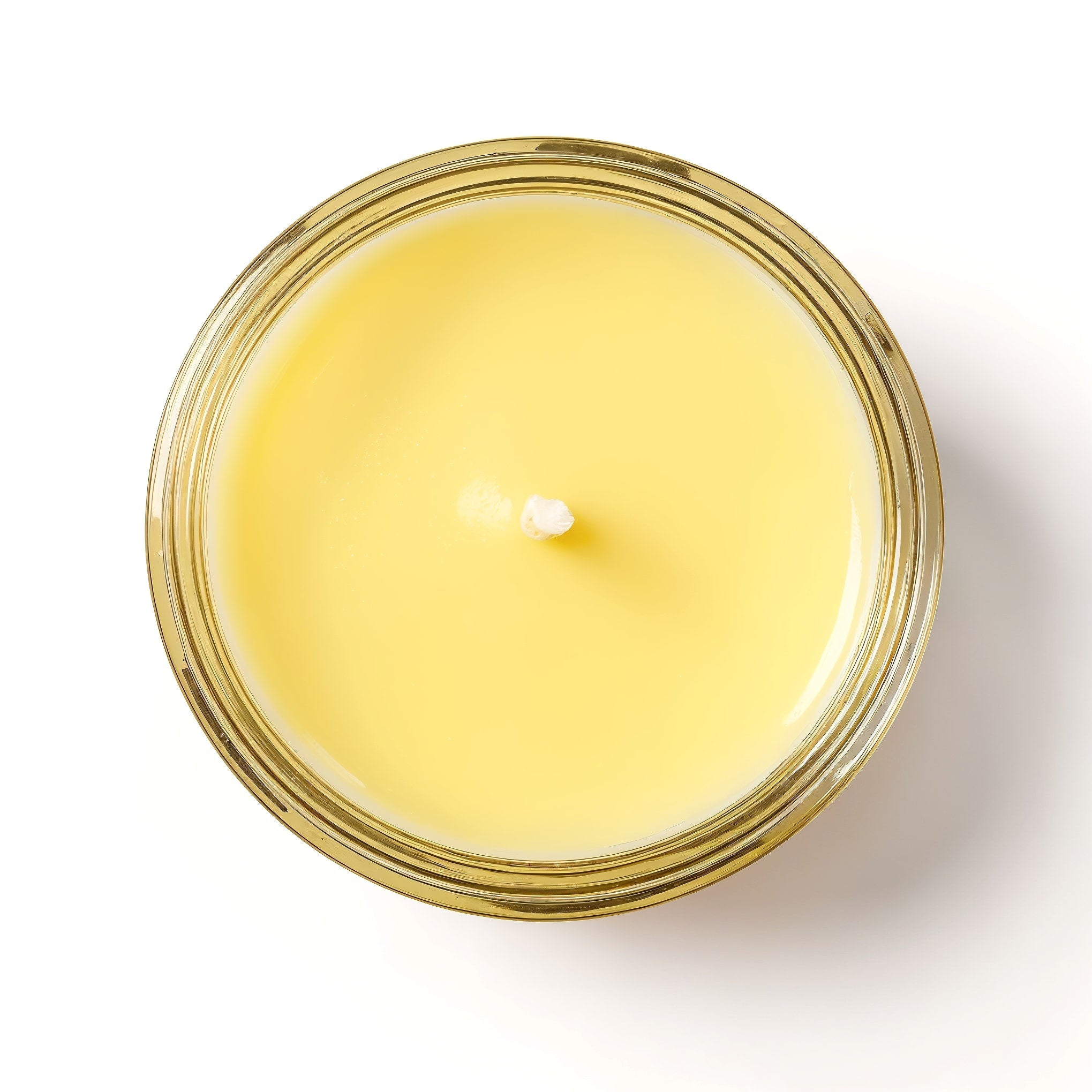 Bougie parfumée NARSAGO Zeste d'agrumes en cire de soja dans un pot en verre jaune