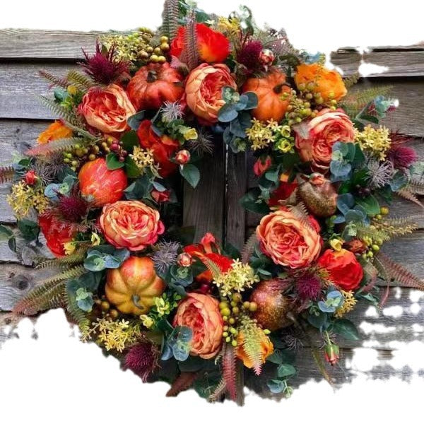 Couronne automnale florale avec citrouilles