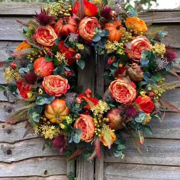 Couronne automnale florale avec citrouilles