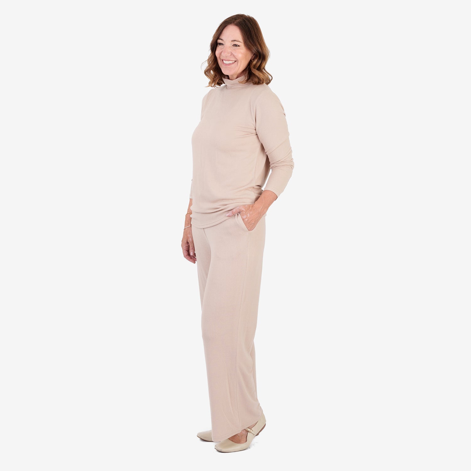 Haut col roulé chiné brossé pour femme avec manches longues et finition côtelée douce