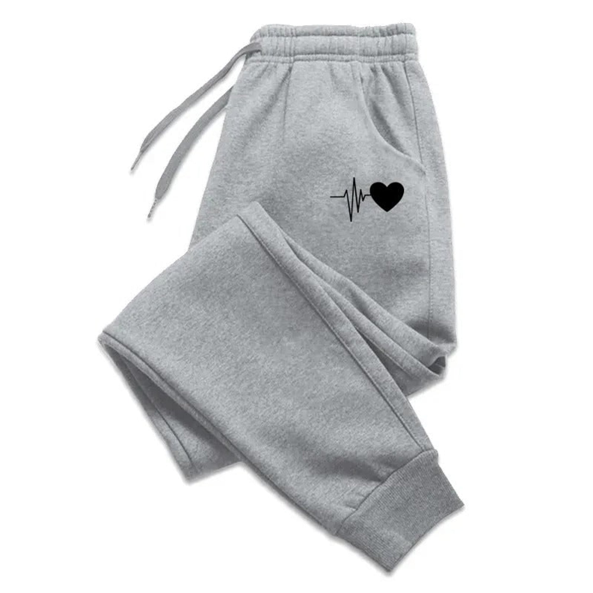 Jogging femme fitness avec taille ajustable à cordon et poches latérales