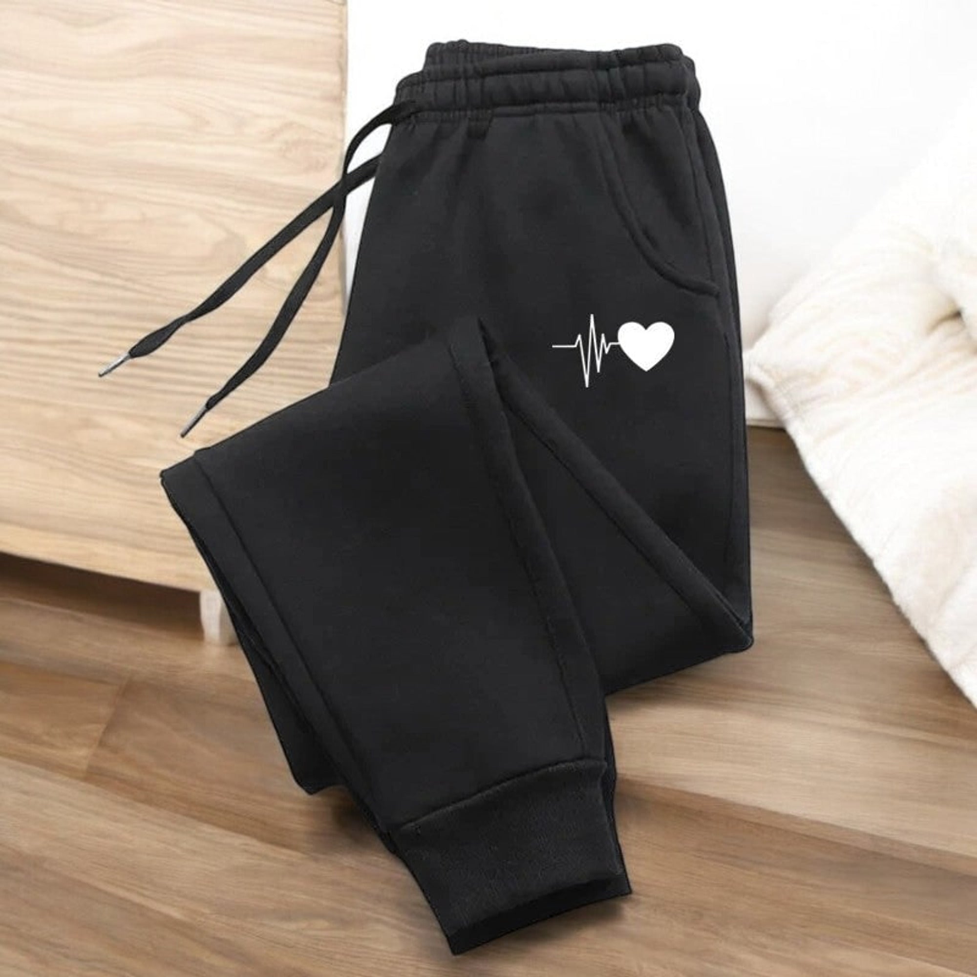 Jogging femme fitness avec taille ajustable à cordon et poches latérales