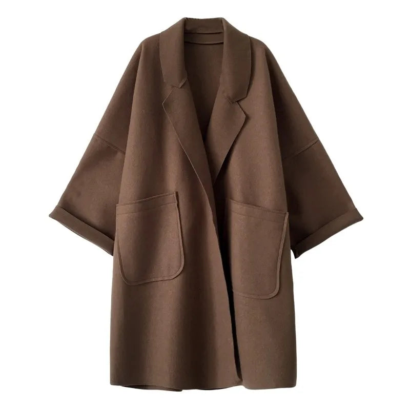 Manteau oversize femme avec revers et poches plaquées, poignets retroussés et épaules tombantes, café ou noir, tailles S
