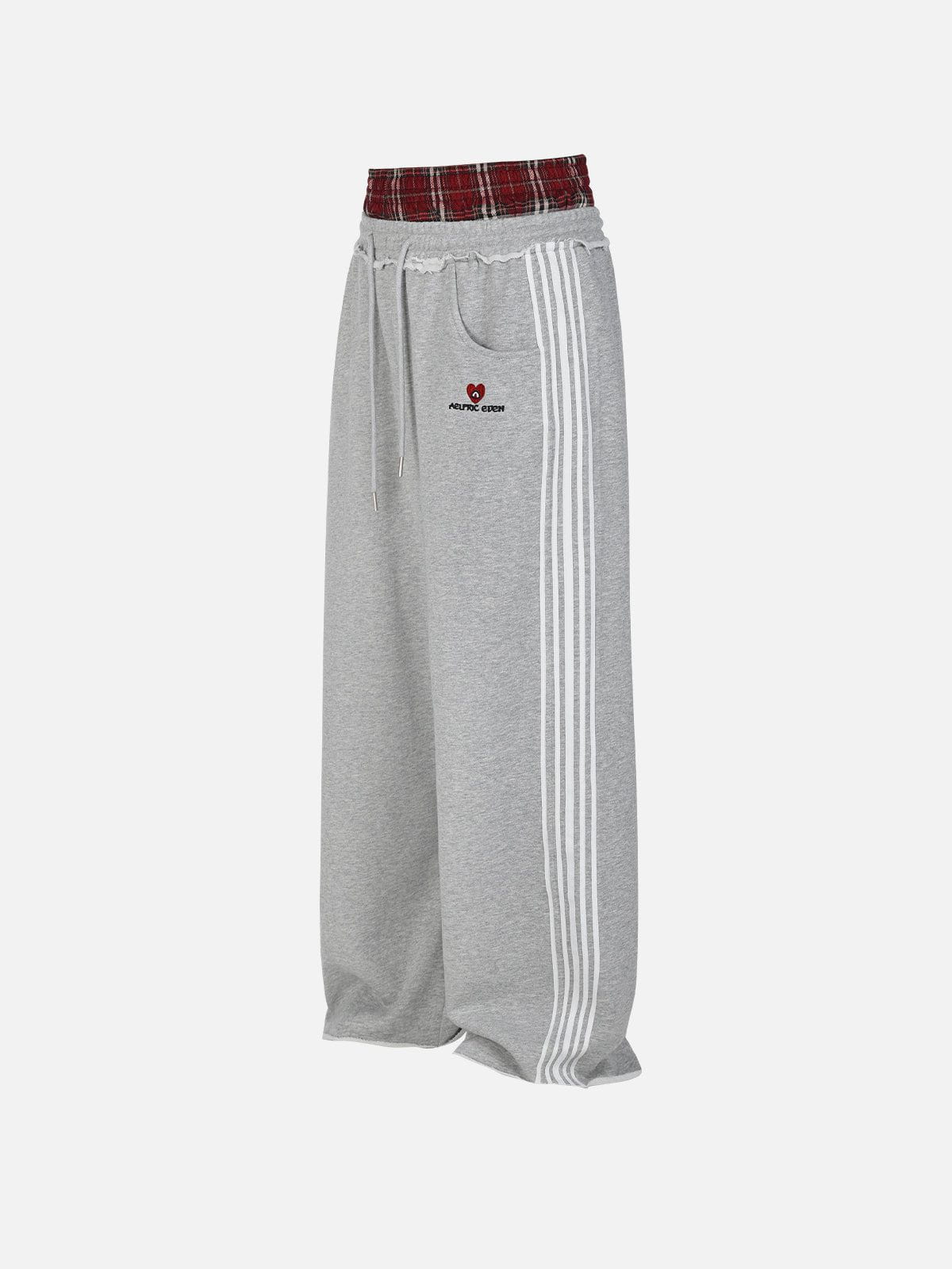 Pantalon de jogging femme à jambes larges, double ceinture, détail patchwork à carreaux