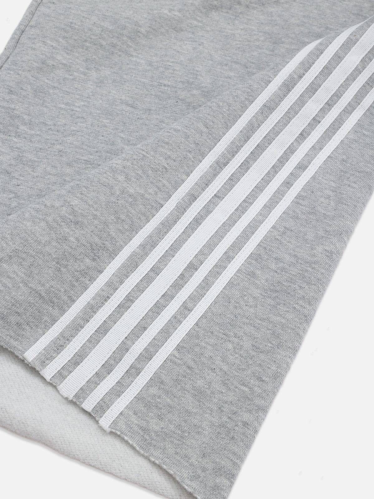 Pantalon de jogging femme à jambes larges, double ceinture, détail patchwork à carreaux