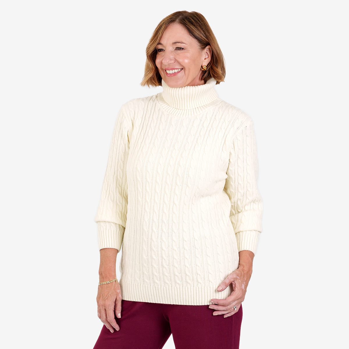 Pull femme col roulé à torsades avec manches longues et finitions côtelées
